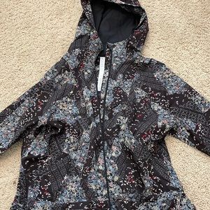 Fun floral print Lululemon rain jacket. Size 6